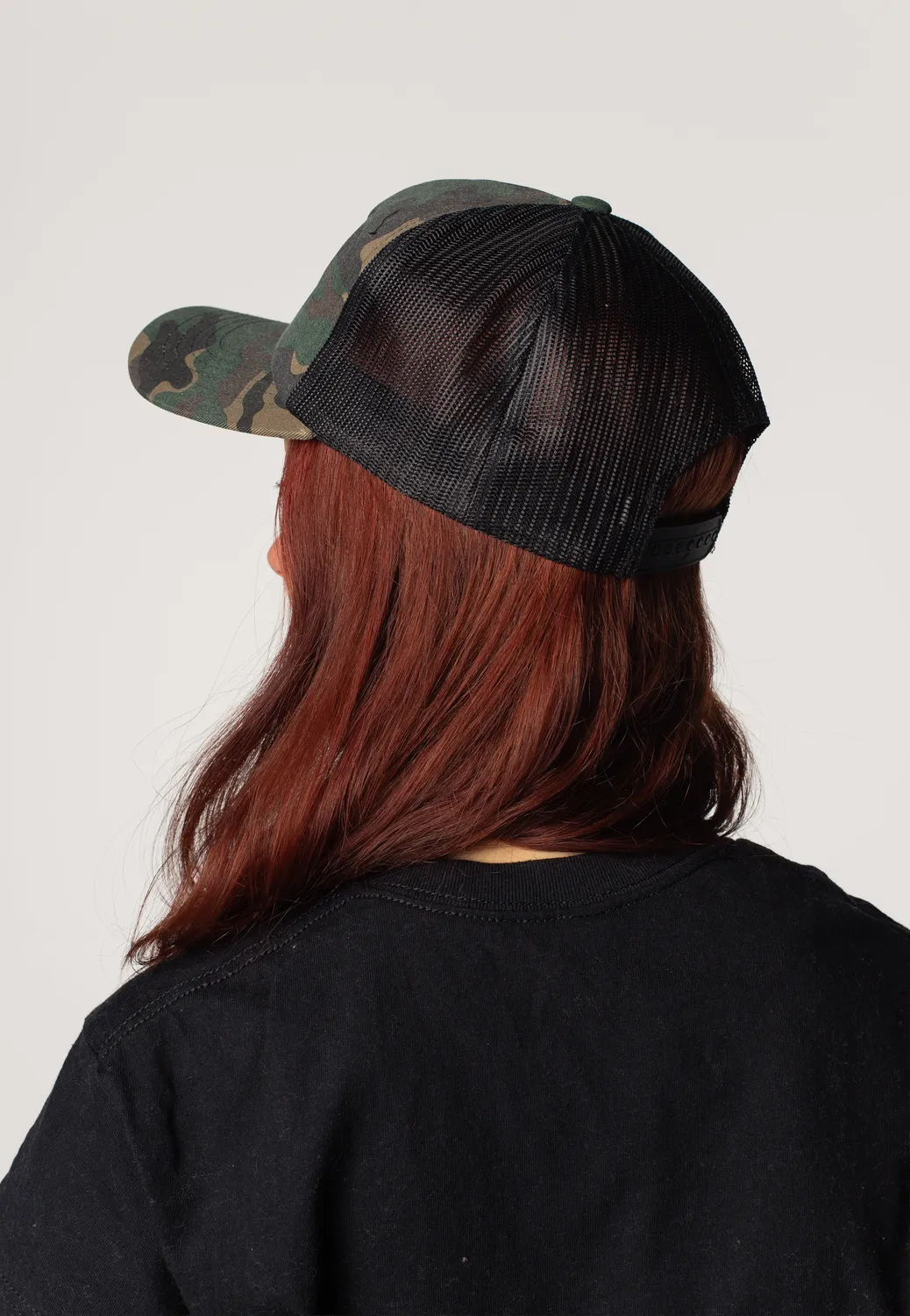 Impericon Orange Logo Trucker Cap Onesize schwarz Camo